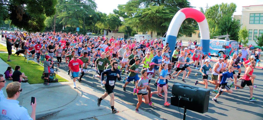 An image of people racing in the Clovis Memorial Run